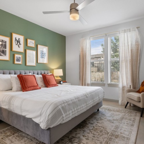 bedroom with a bed and a fan