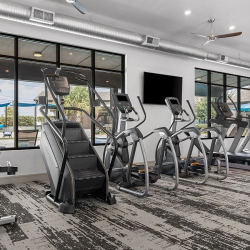 a fitness center with exercise equipment