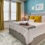 Large bedroom with large window for plenty of natural lighting