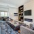 Clubhouse with two large bookshelves and plush couch seating.